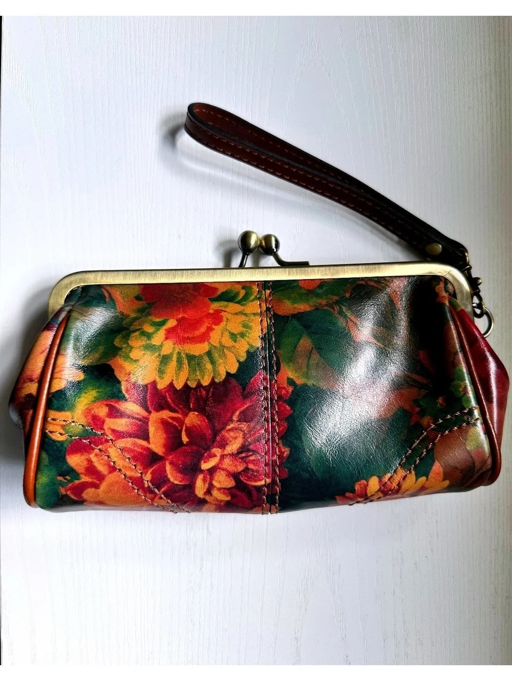 Patricia Nash Leather Wristlet with Retro Floral Print and Kiss Lock Closure